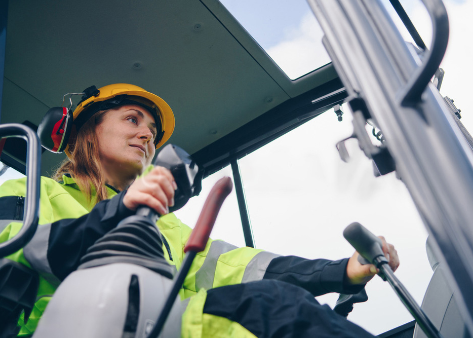 female heavy equipment operator