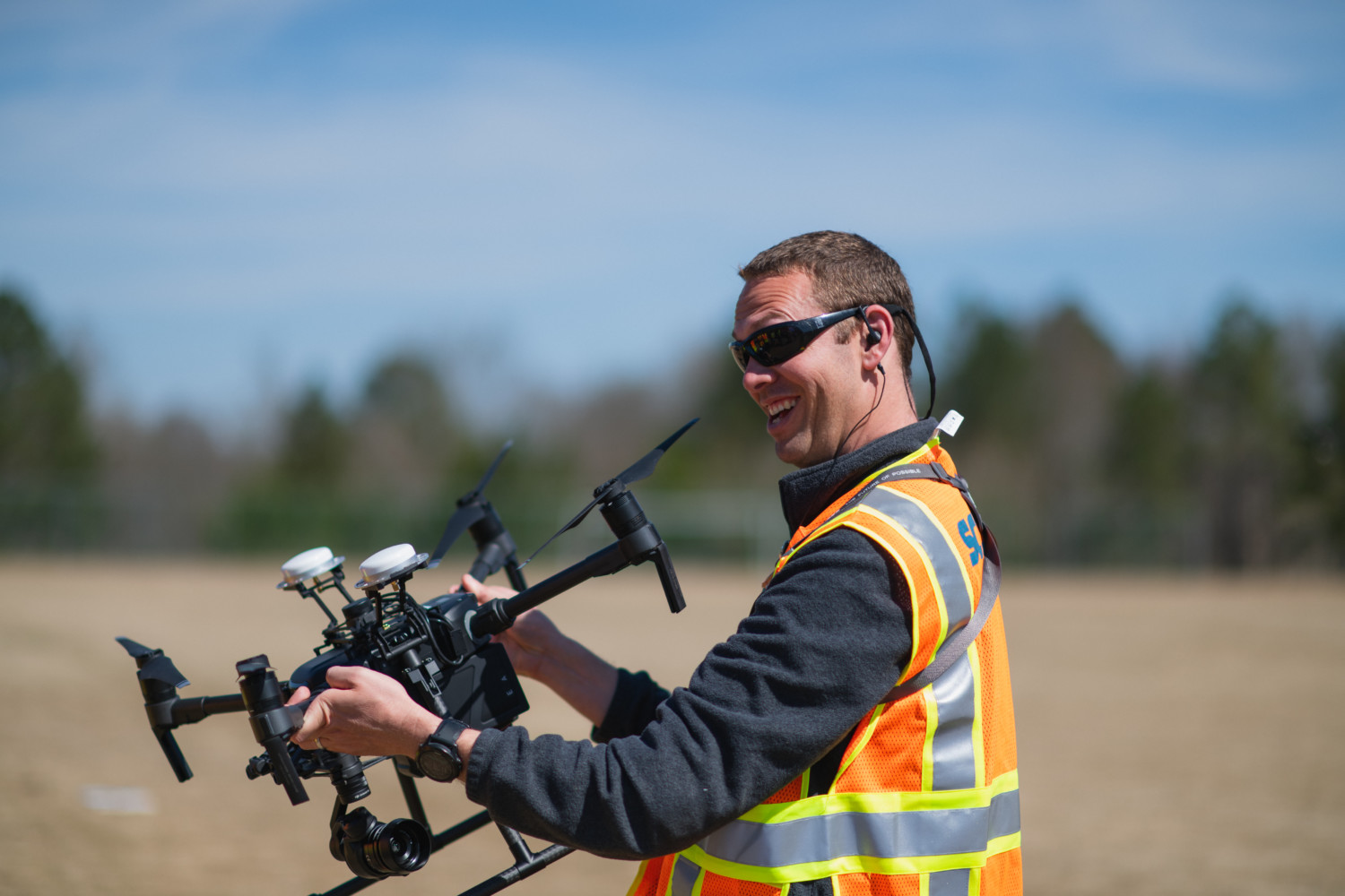 Dr. Joseph Burgett prepares to fly a drone