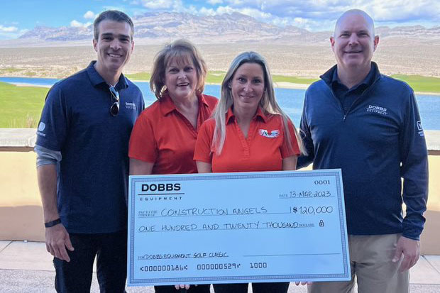 Dobbs Equipment Employees Present a Check to Construction Angels