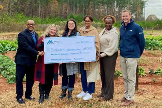 Martin Marietta Employees present a check to McCrorey YMCA